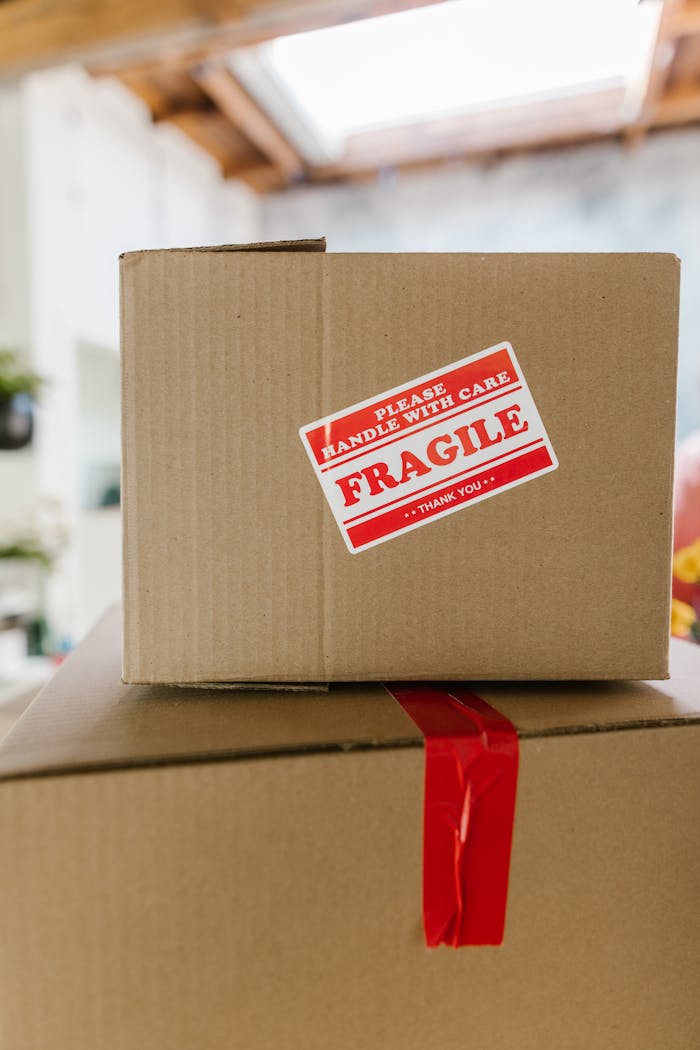 Close-Up Shot of Two Brown Shipping Boxes